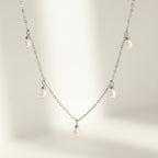 Oval Pearl Pearl Tassel Necklace - Excluze